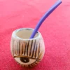 Mate de ceramica artesanal con un diseño frida